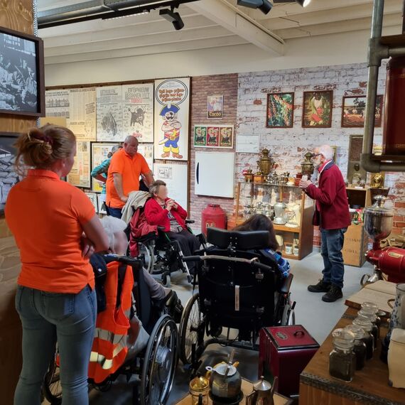 Dutch Reynaers colleagues visiting a museum with senior citizens.